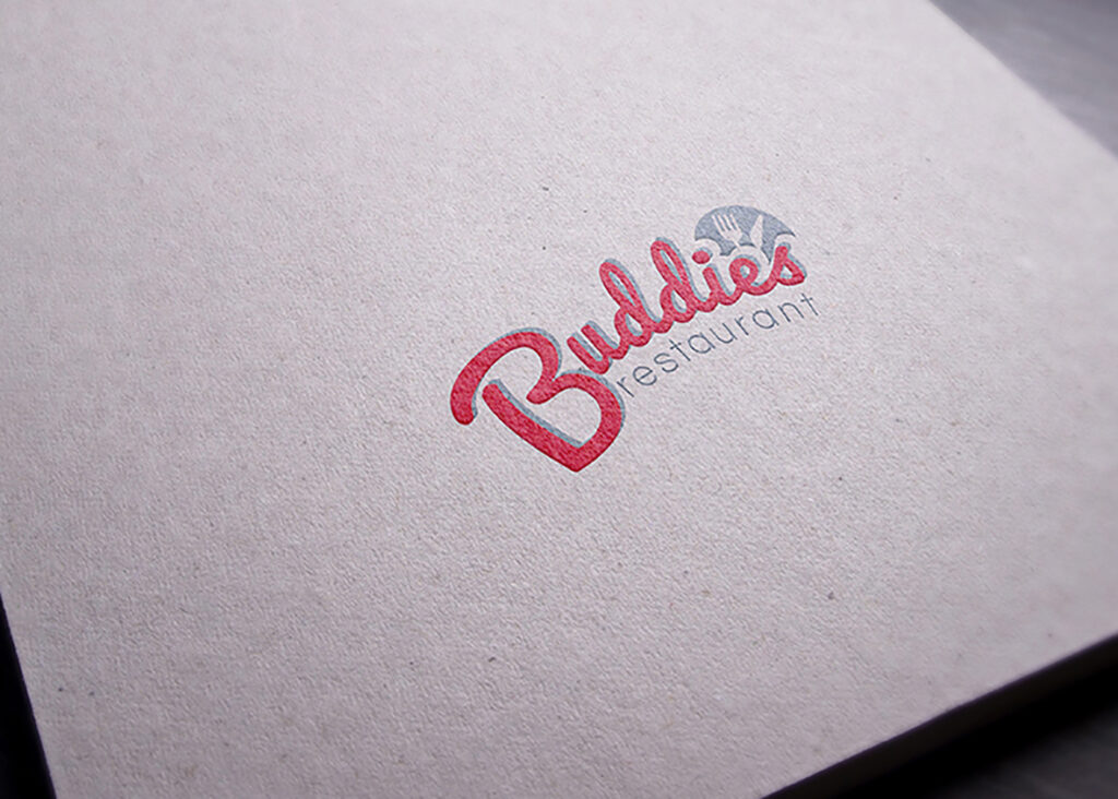 Logo Buddies restaurant — červený rukopisný nápis s příborem v obrysu talíře